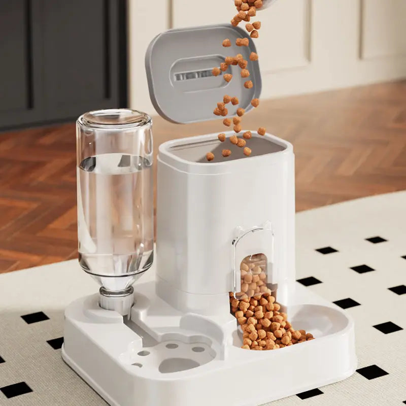 The Purr-fect Hydration Station: A Fancy Feline Fountain with a Snack Sink, No Batteries Required, for Thirsty Tails and Clean-Up Challenged Humans!